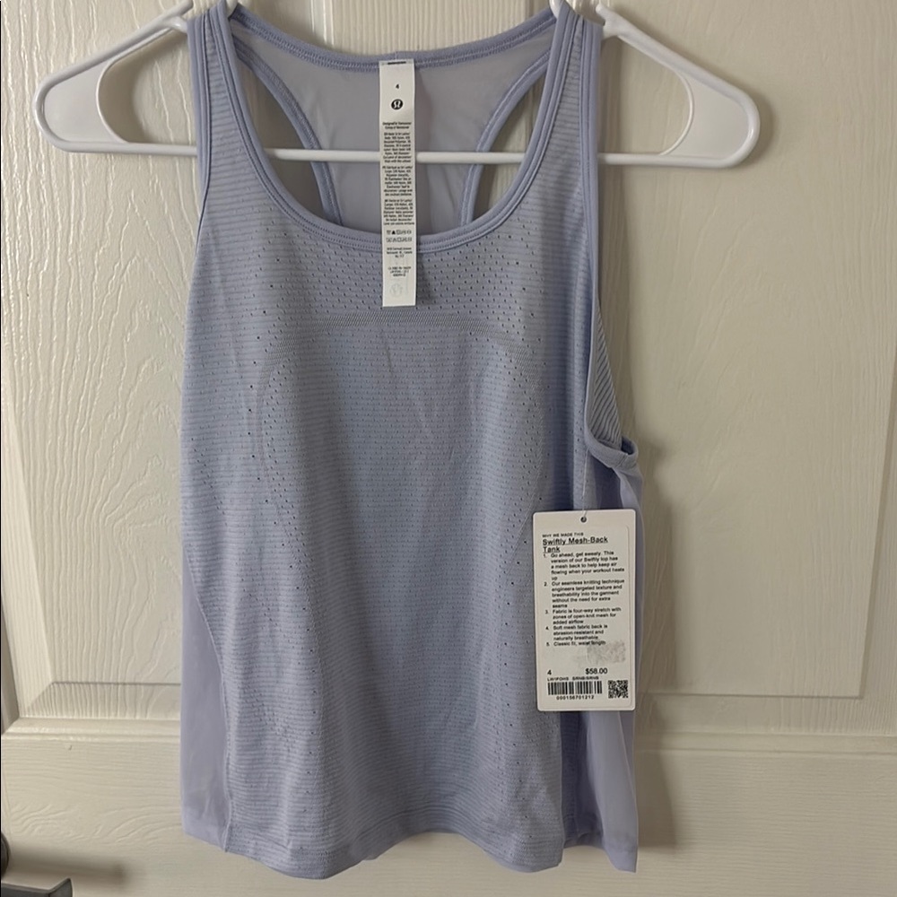 NWT Lululemon swiftly tank top 
Size 4 
Lavender purple